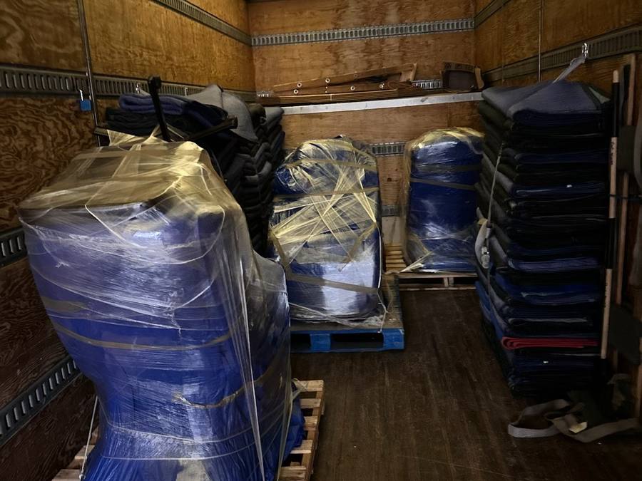 Furniture padded and shrink wrapped inside the truck for the Vancouver to Calgary move